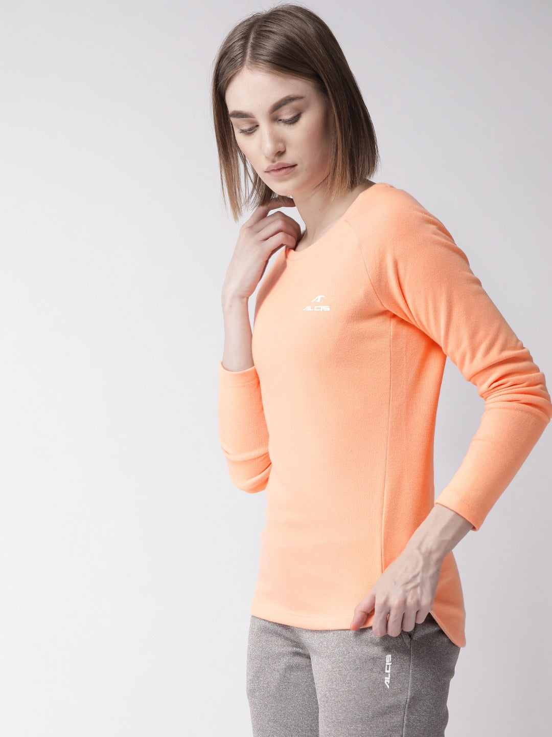 Alcis Women Peach-Coloured Solid Round Neck Sporty T-shirt