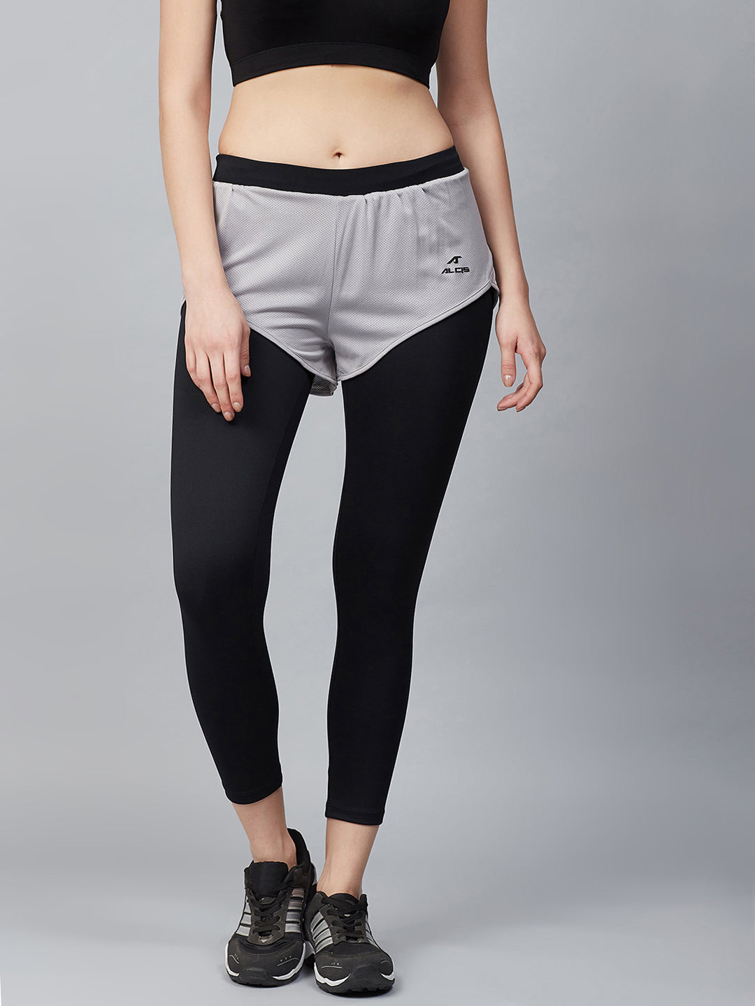 Alcis Women Black & Grey Colourblocked Cropped Running Tights