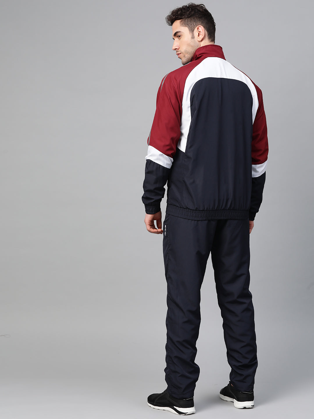 Alcis Men Navy Blue & White Colourblocked Sports Tracksuit with Printed Detail