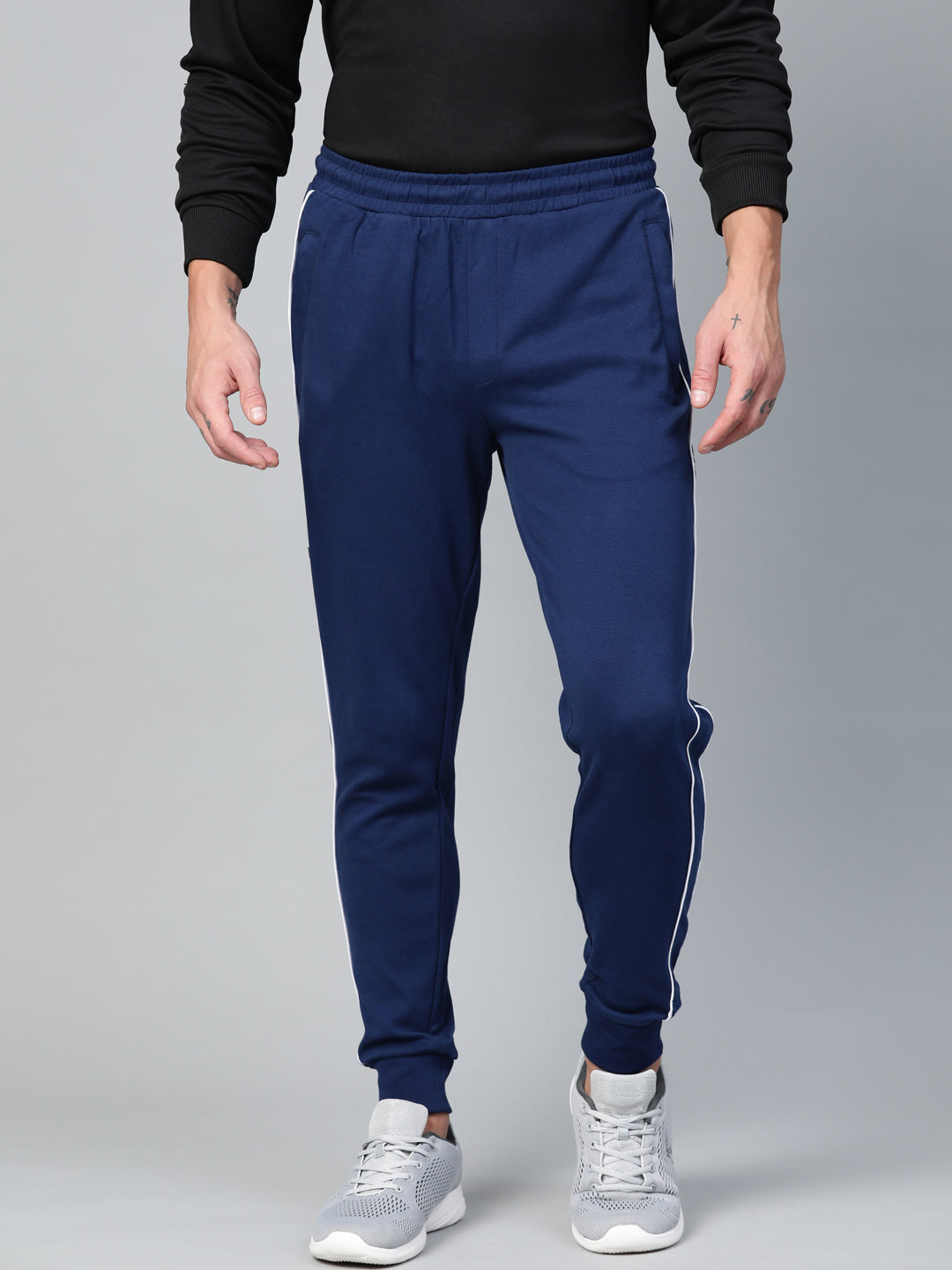 Alcis Men Navy Blue Solid Joggers with Side Striped Detail