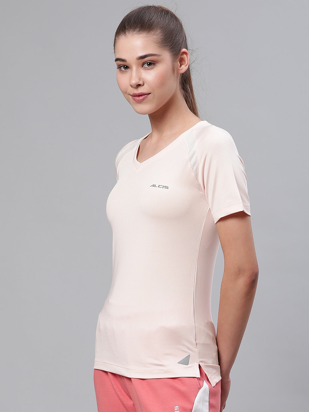Alcis Women Peach-Coloured Solid Round Neck Training T-shirt