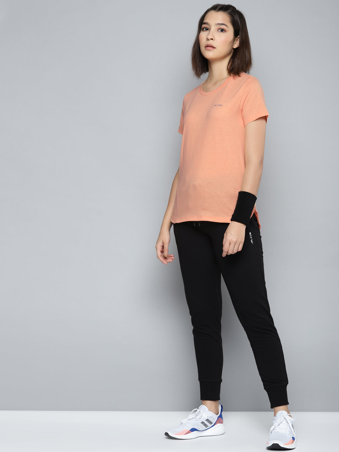 Alcis Women Peach-Coloured Slim Fit Solid Round Neck T-shirt